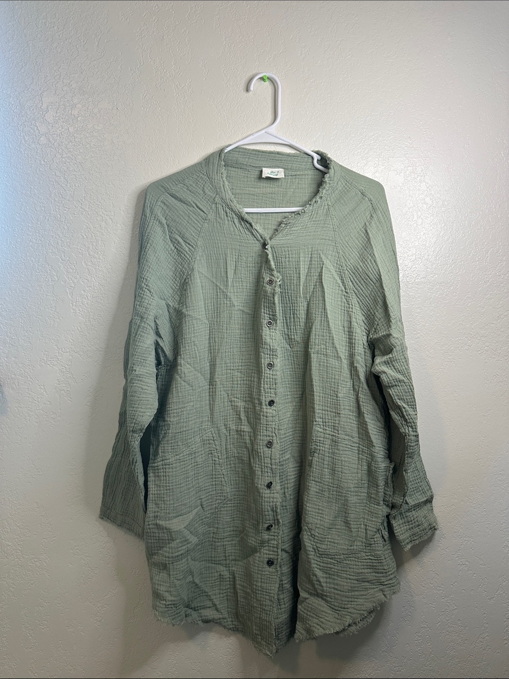 Sage green crinkled gauze button-down tunic